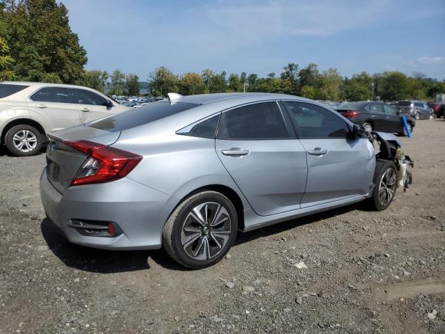 Photo 3 from auction – 2017 HONDA CIVIC EXL with VIN 2HGFC1F70HH659944
