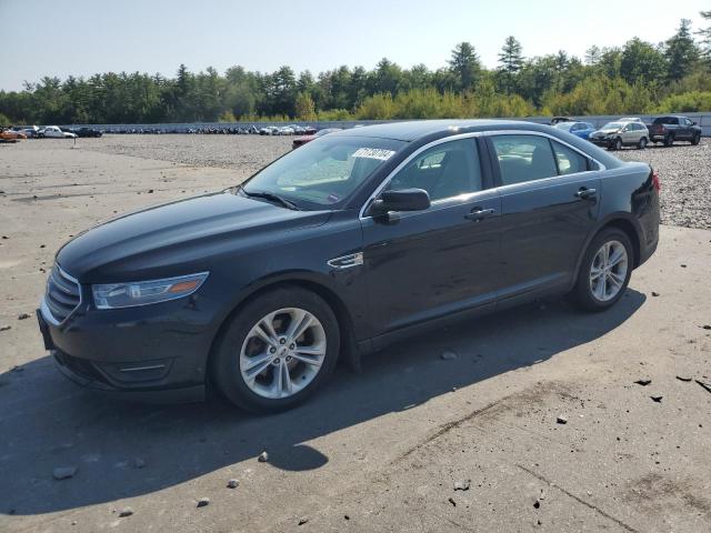 FORD TAURUS SEL 2014 with VIN 1FAHP2H84EG141498 - Photo from auction