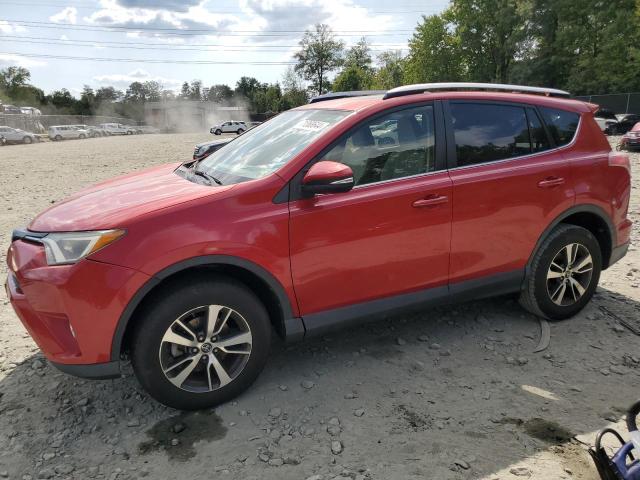 TOYOTA RAV4 XLE 2016 with VIN JTMRFREV8GJ063074 - Photo from auction