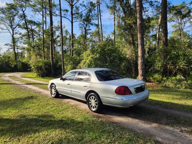 Photo 3 from auction – 2002 LINCOLN CONTINENTA with VIN 1LNHM97V52Y664176