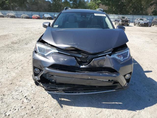 Photo 5 from auction – 2017 TOYOTA RAV4 XLE with VIN JTMRFREV9HJ173715