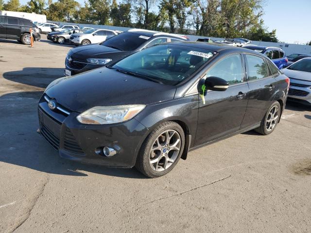 FORD FOCUS SE 2014 with VIN 1FADP3F21EL109795 - Photo from auction