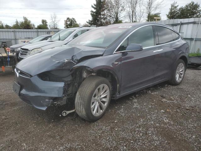 TESLA MODEL X 2021 with VIN 5YJXCDE27MF320737 - Photo from auction