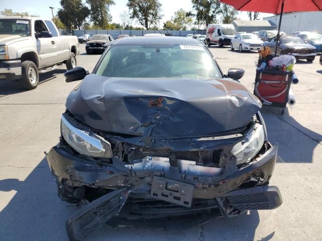 Photo 5 from auction – 2018 HONDA CIVIC EX with VIN 2HGFC2F70JH509425
