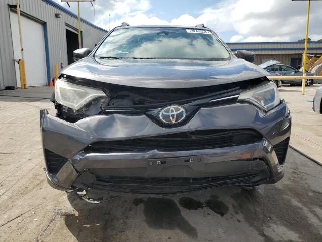 Photo 5 from auction – 2017 TOYOTA RAV4 LE with VIN JTMBFREV5HJ150952