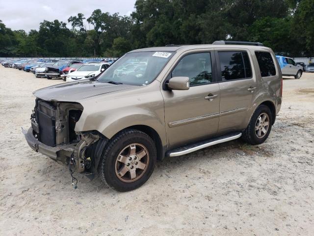 HONDA PILOT TOUR 2011 with VIN 5FNYF3H98BB053040 - Photo from auction