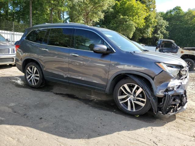 Photo 4 from auction – 2017 HONDA PILOT ELIT with VIN 5FNYF6H02HB100848