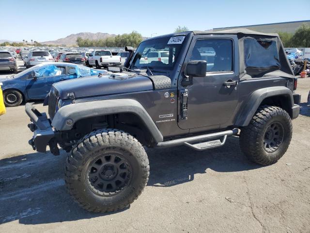 JEEP WRANGLER S 2014 with VIN 1C4AJWAG4EL244983 - Photo from auction