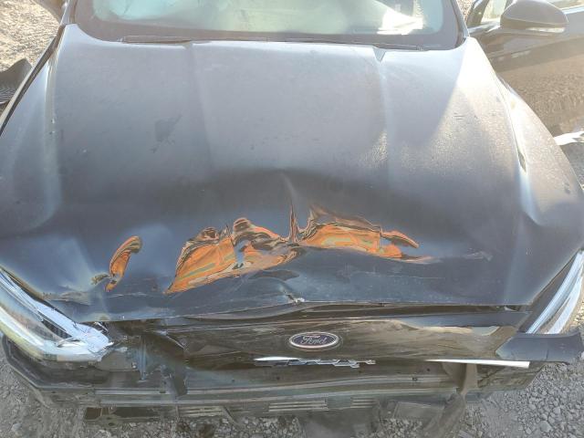 Photo 11 from auction – 2019 FORD FUSION TIT with VIN 3FA6P0D96KR184562