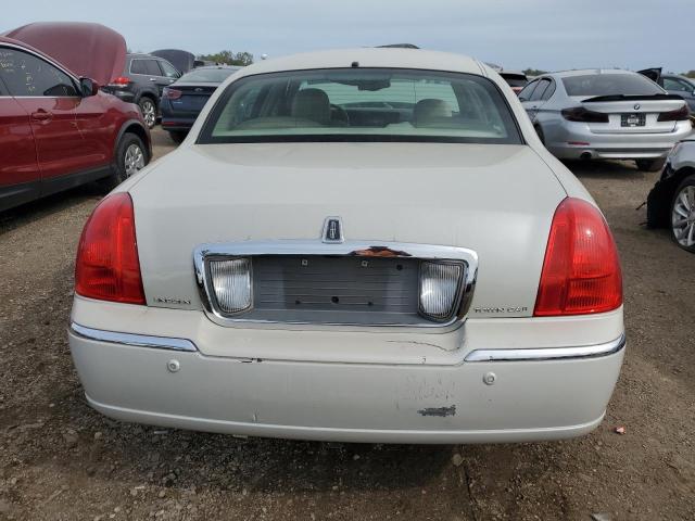 Photo 6 from auction – 2004 LINCOLN TOWN CAR U with VIN 1LNHM83W24Y629932