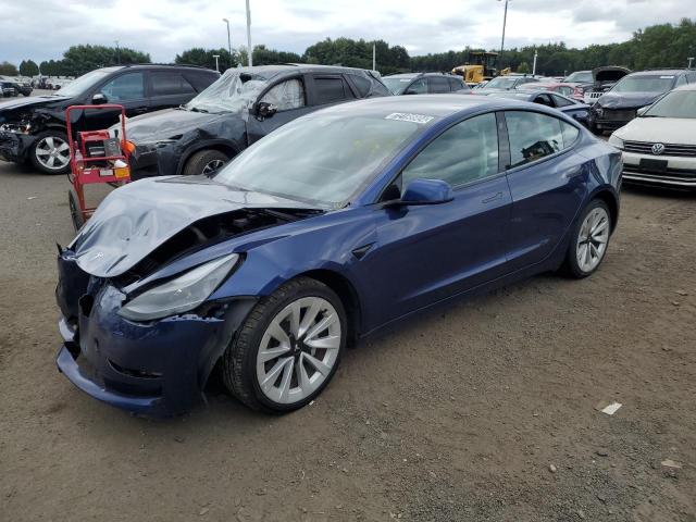 TESLA MODEL 3 2022 with VIN 5YJ3E1EA2NF285556 - Photo from auction