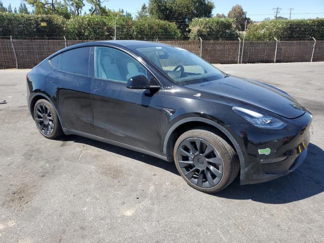 Photo 4 from auction – 2022 TESLA MODEL Y with VIN 7SAYGAEE8NF570333