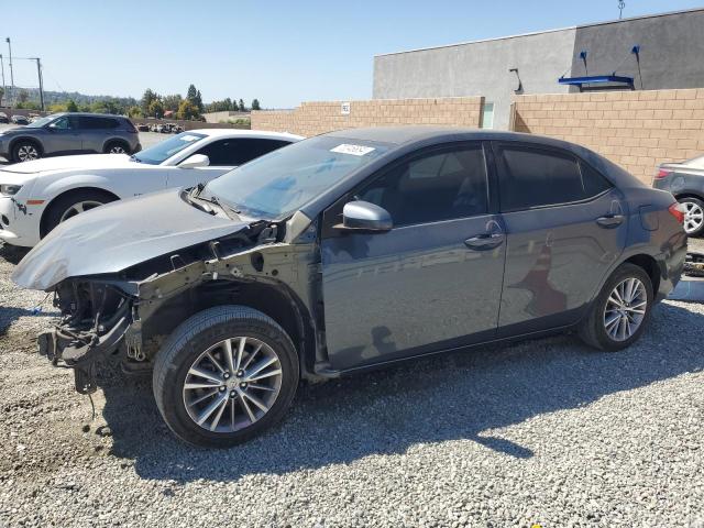 TOYOTA COROLLA L 2014 with VIN 2T1BURHEXEC174396 - Photo from auction