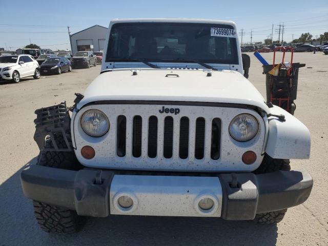 Photo 5 from auction – 2012 JEEP WRANGLER U with VIN 1C4BJWEG2CL281493