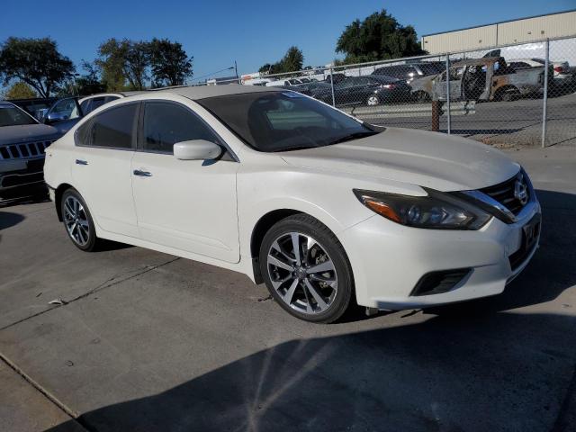 Photo 4 from auction – 2016 NISSAN ALTIMA 2.5 with VIN 1N4AL3AP2GC284593