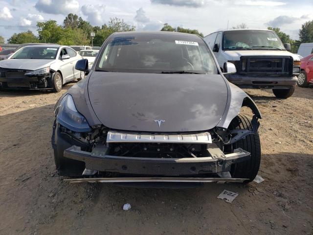 Photo 5 from auction – 2023 TESLA MODEL Y with VIN 7SAYGDEFXPF909526