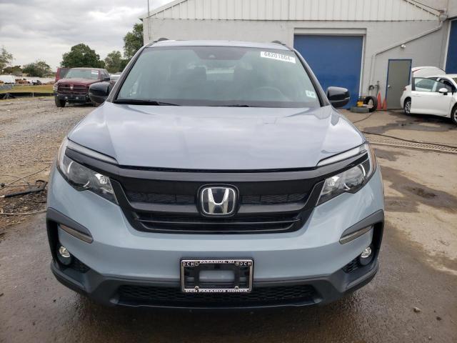 Photo 5 from auction – 2022 HONDA PILOT TRAI with VIN 5FNYF6H82NB048400