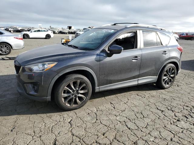 MAZDA CX-5 GT 2014 with VIN JM3KE2DY0E0384978 - Photo from auction