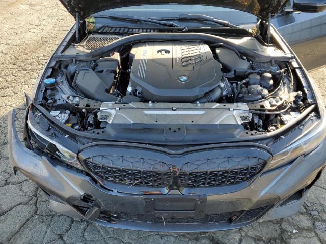 Photo 11 from auction – 2022 BMW M340I with VIN 3MW5U7J00N8C57770
