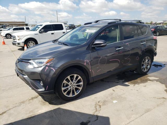 TOYOTA RAV 2018 with VIN JTMYFREV4JD114992 - Photo from auction