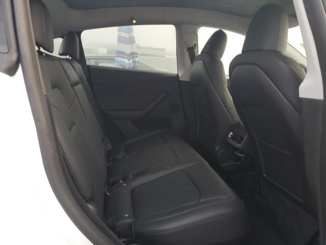 Photo 11 from auction – 2023 TESLA MODEL Y with VIN 7SAYGDEEXPA130244