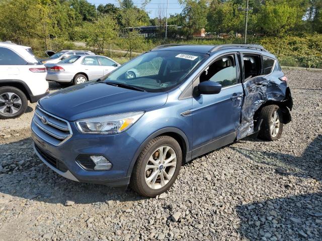 FORD ESCAPE SE 2018 with VIN 1FMCU9GD5JUC30170 - Photo from auction
