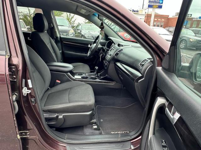 Photo 5 from auction – 2014 KIA SORENTO LX with VIN 5XYKT3A65EG487511