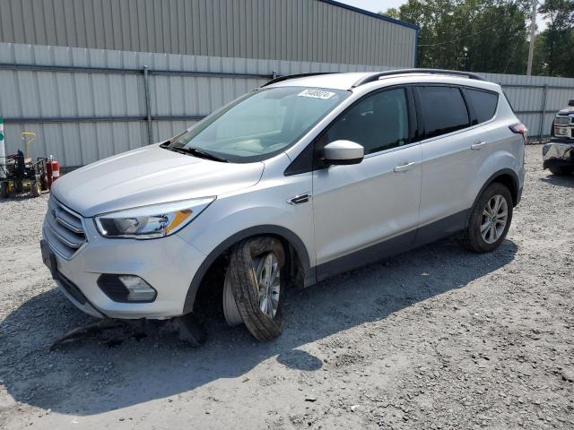 FORD ESCAPE SE 2018 with VIN 1FMCU9GDXJUB55000 - Photo from auction
