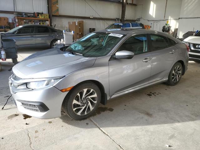 HONDA CIVIC EX 2016 z numerem VIN 2HGFC2F74GH028411 - Zdjęcie z aukcji