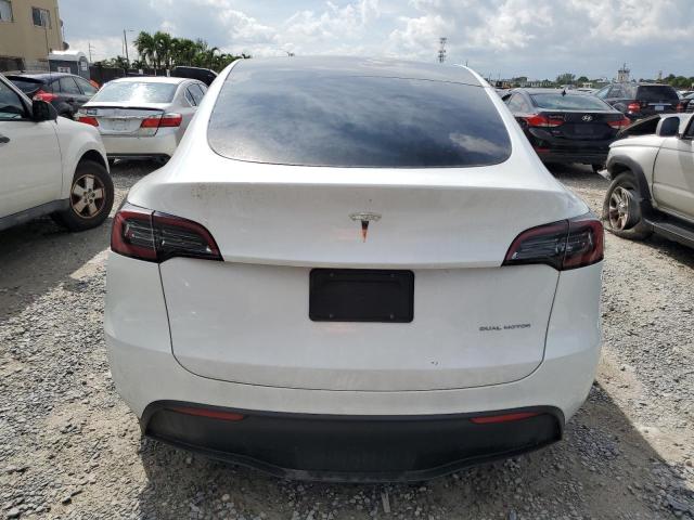Photo 6 from auction – 2023 TESLA MODEL Y with VIN 7SAYGAEE4PF595216