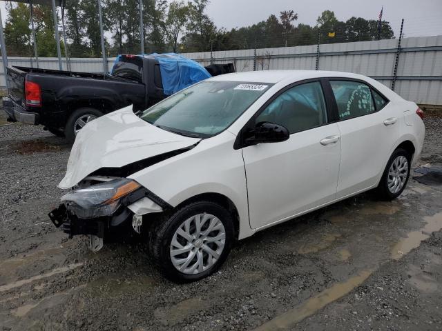 TOYOTA COROLLA 2019 with VIN 5YFBURHE4KP916982 - Photo from auction