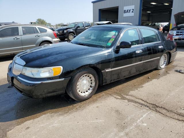 LINCOLN TOWN CAR E 2000 with VIN 1LNHM81W5YY939078 - Photo from auction
