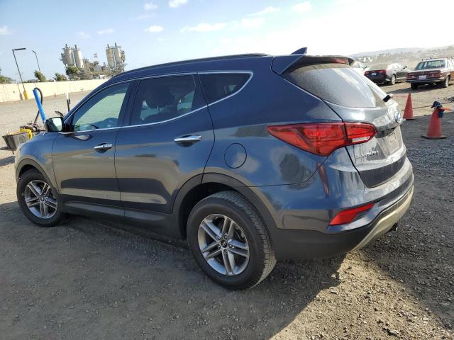 Photo 2 from auction – 2018 HYUNDAI SANTA FE S with VIN 5NMZU3LB4JH105961