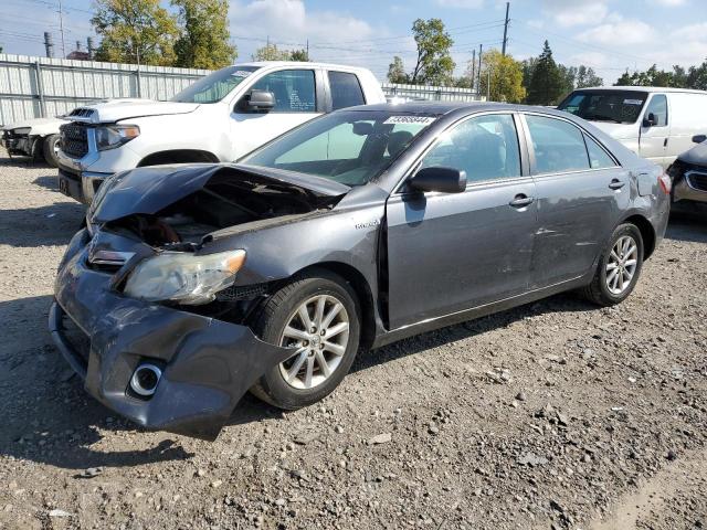 TOYOTA CAMRY HYBR 2011 with VIN 4T1BB3EK4BU128991 - Photo from auction