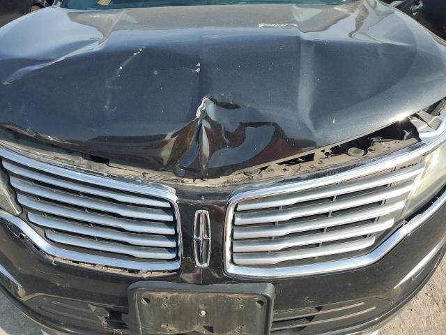Photo 12 from auction – 2015 LINCOLN MKC with VIN 5LMCJ2A9XFUJ03102