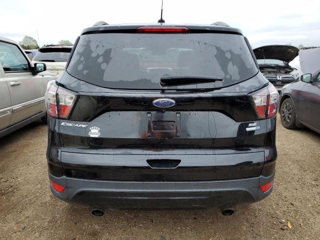 Photo 6 from auction – 2017 FORD ESCAPE SE with VIN 1FMCU9GD8HUD14736