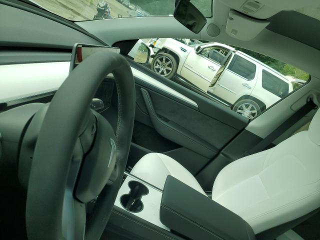 Photo 9 from auction – 2023 TESLA MODEL Y with VIN 7SAYGDEE4PA099864