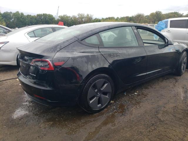 Снимка 3 от търг – 2021 TESLA MODEL 3 с VIN 5YJ3E1EB3MF984301