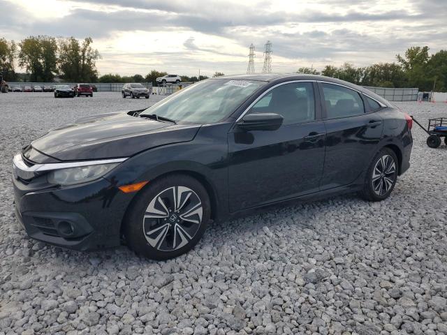 HONDA CIVIC EX 2017 with VIN 19XFC1F38HE004163 - Photo from auction
