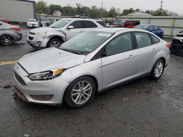 FORD FOCUS SE 2016 with VIN 1FADP3F28GL301184 - Photo from auction