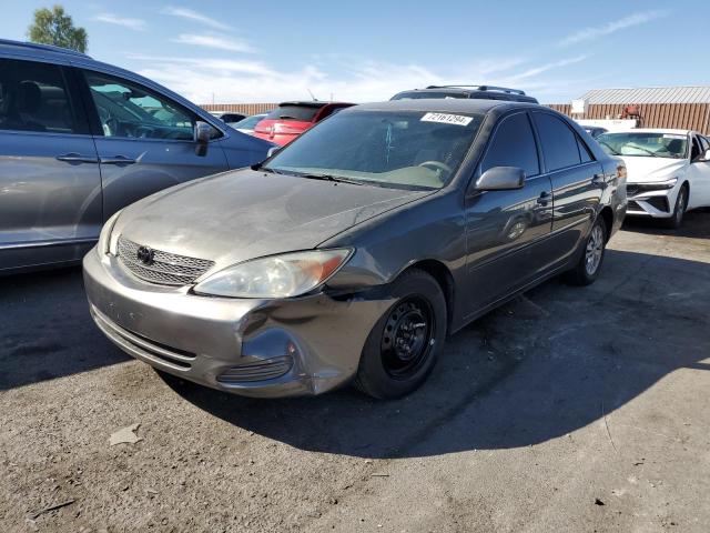 TOYOTA CAMRY LE 2004 with VIN 4T1BF32K54U586969 - Photo from auction