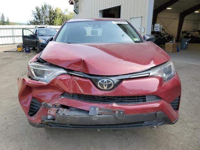 Photo 5 from auction – 2018 TOYOTA RAV4 LE with VIN 2T3BFREV7JW825384