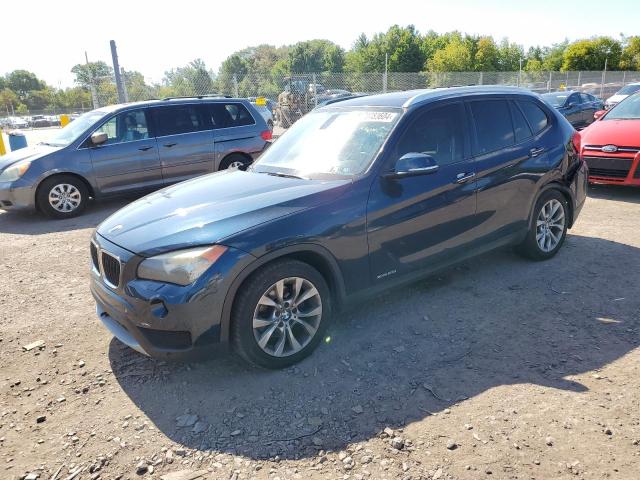 BMW X1 XDRIVE2 2013 with VIN WBAVL1C5XDVR89831 - Photo from auction