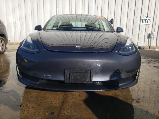 Photo 5 from auction – 2022 TESLA MODEL 3 with VIN 5YJ3E1EA9NF130342