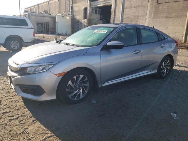 HONDA CIVIC EX 2016 with VIN 19XFC2F85GE085574 - Photo from auction