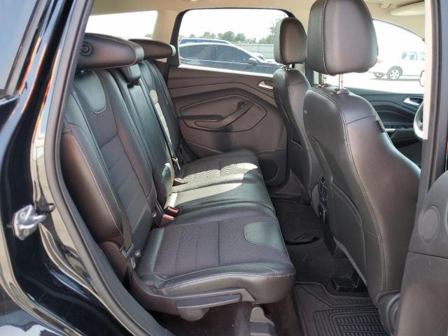 Photo 11 from auction – 2016 FORD ESCAPE SE with VIN 1FMCU9GX3GUB03033