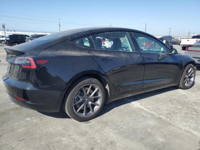 Photo 3 from auction – 2022 TESLA MODEL 3 with VIN 5YJ3E1EA0NF288049