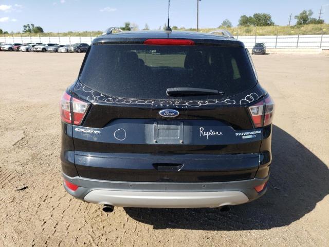Photo 6 from auction – 2017 FORD ESCAPE TIT with VIN 1FMCU9J94HUD80687