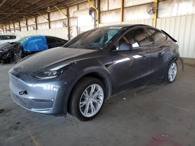 TESLA MODEL Y 2023 with VIN 7SAYGDED3PF971865 - Photo from auction