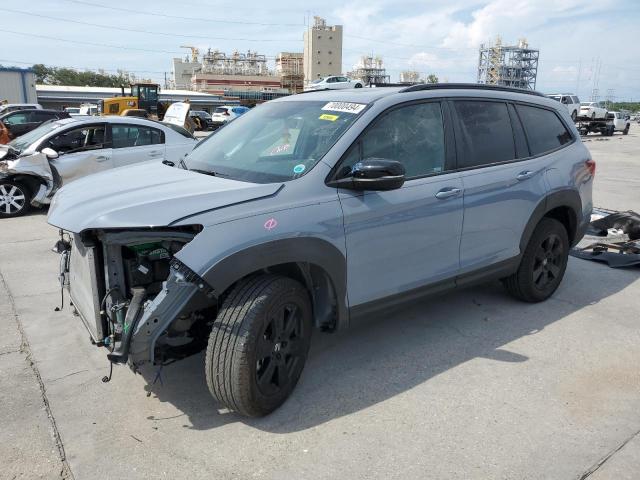 HONDA PILOT TRAI 2022 with VIN 5FNYF6H80NB068130 - Photo from auction
